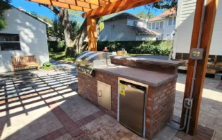 Designing an Outdoor Kitchen With Paver Flooring in 30A Florida