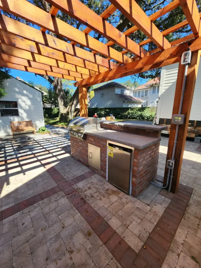 Designing an Outdoor Kitchen With Paver Flooring in 30A Florida